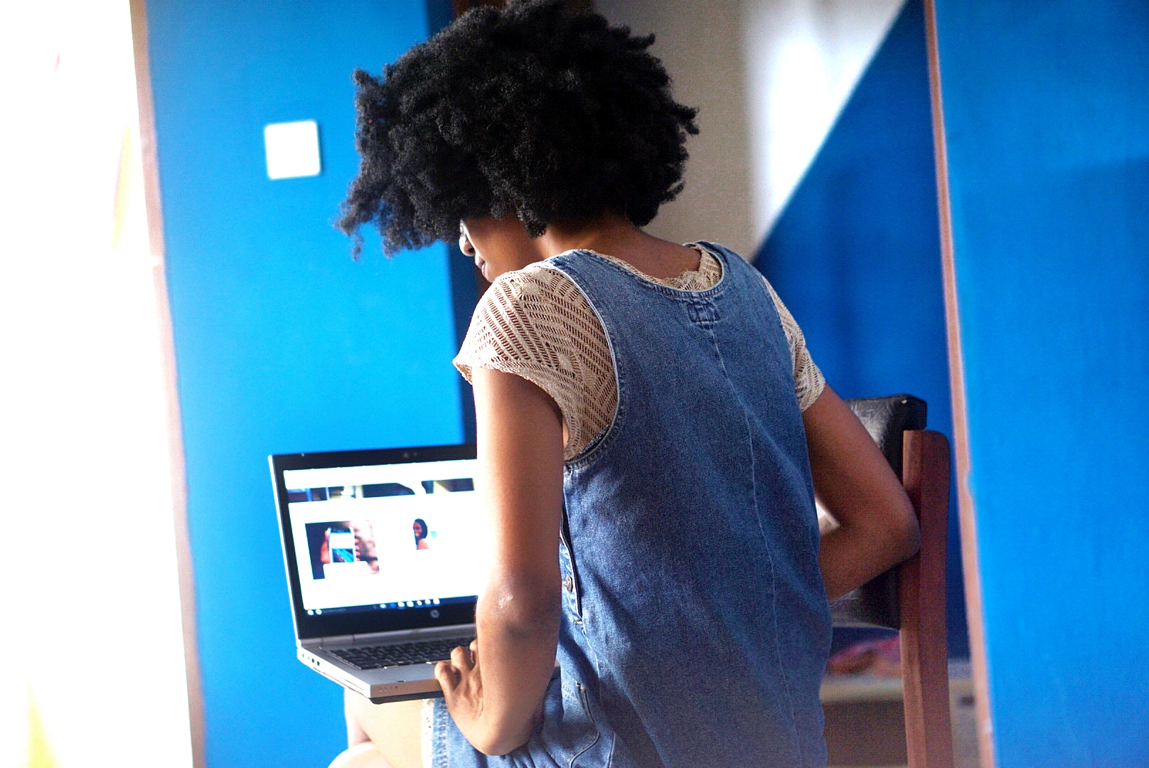 Life Lately blog post, Nigerian Fashion and lifestyle blogger Cassie Daves working on a computer 
