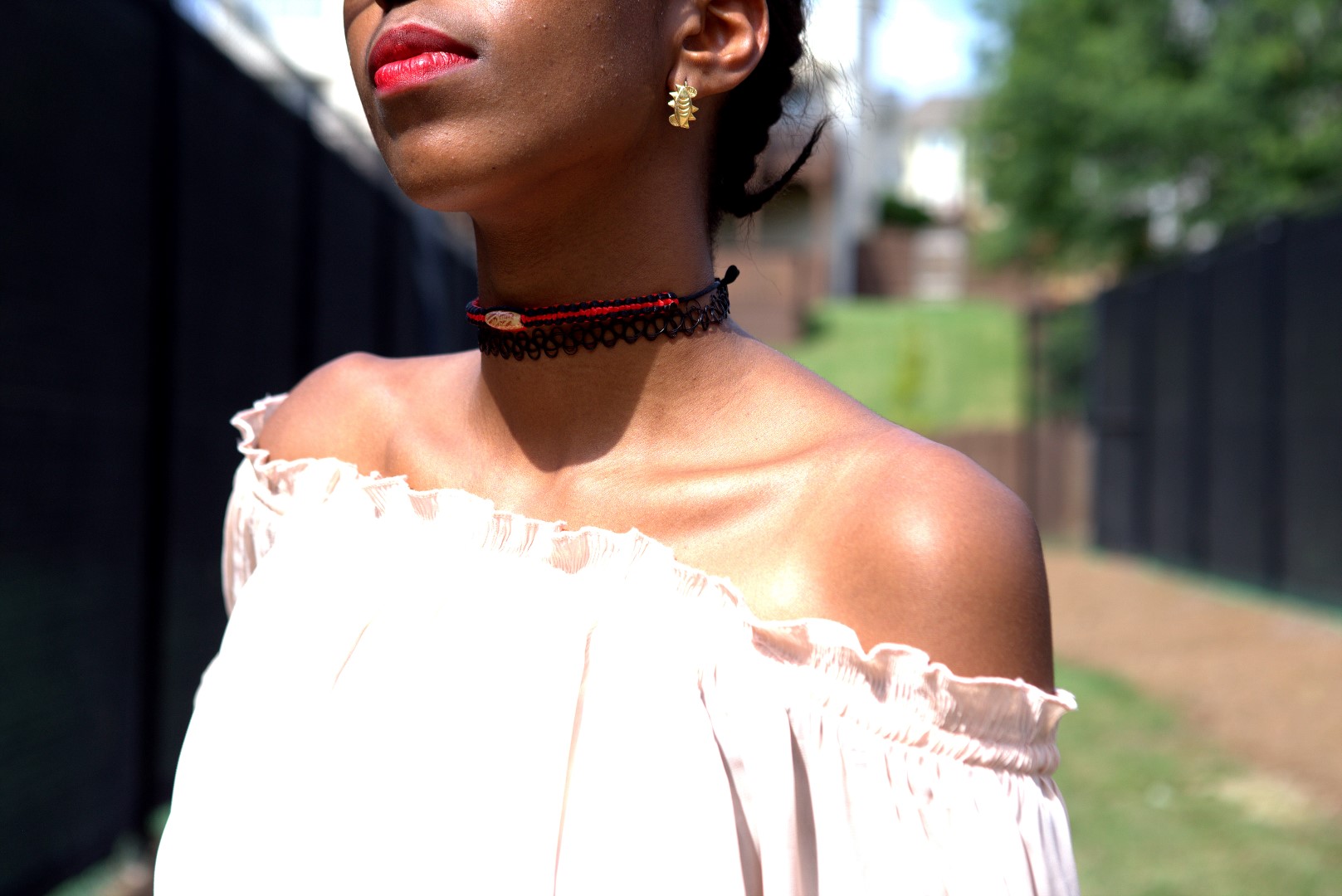Fashion and Lifestyle blogger Cassie Daves in off shoulder top with choker necklace