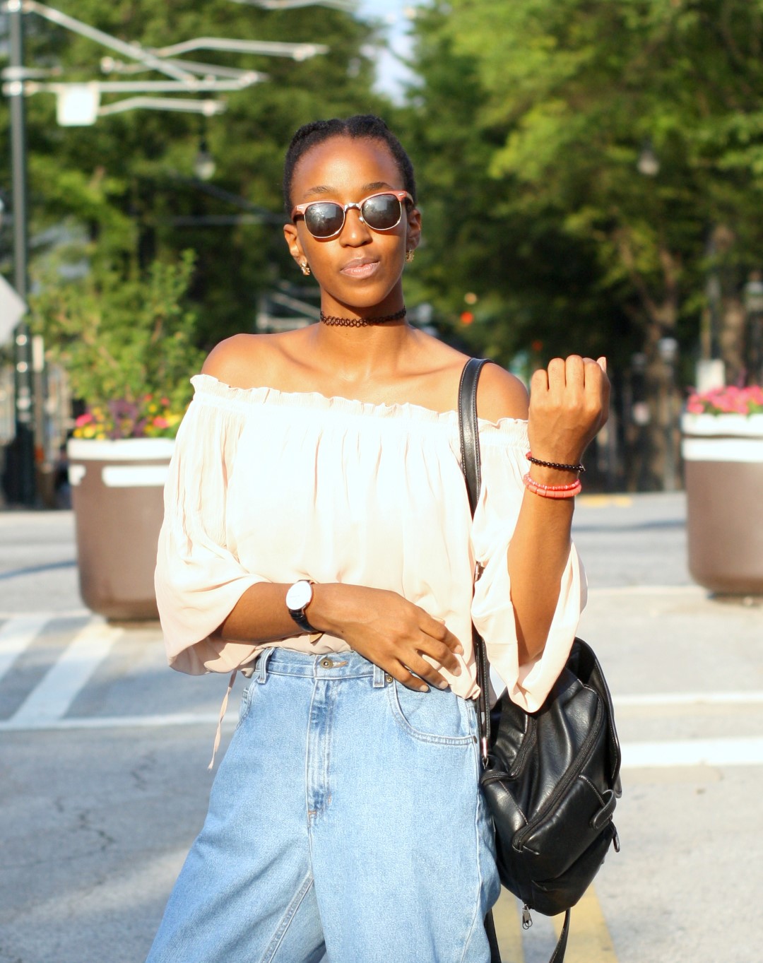 Nigerian fashion blogger in brown off shoulder top with raybans sunshades 