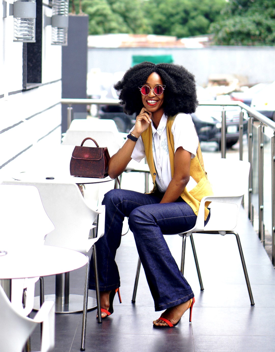 Nigerian lifestyle blogger Cassie Daves in high waisted flare jeans 