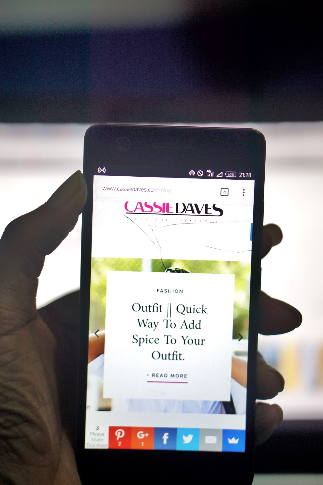 Picture of a phone showing the cassie daves blog home page