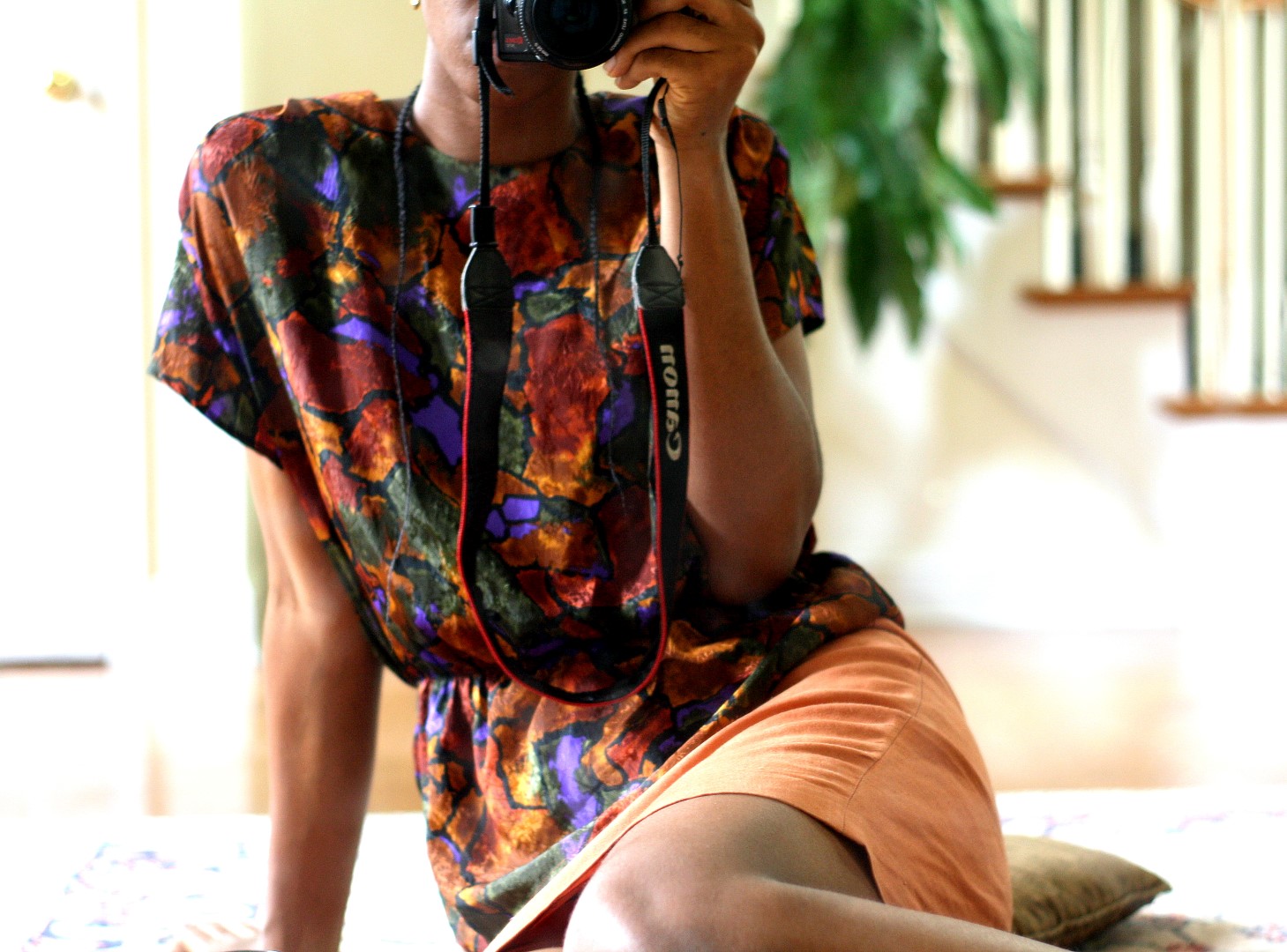 Going back to the basics - Nigerian fashion blogger Cassie Daves wearing a bright colored prints top