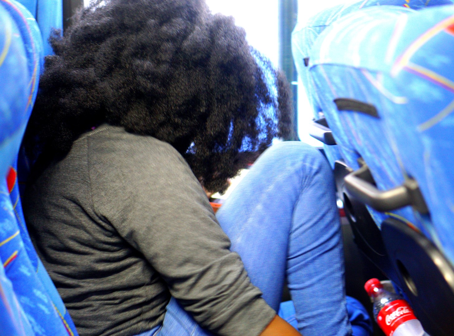 Nigerian Blogger Nappyhaired on a bus going from lagos to ghana by road