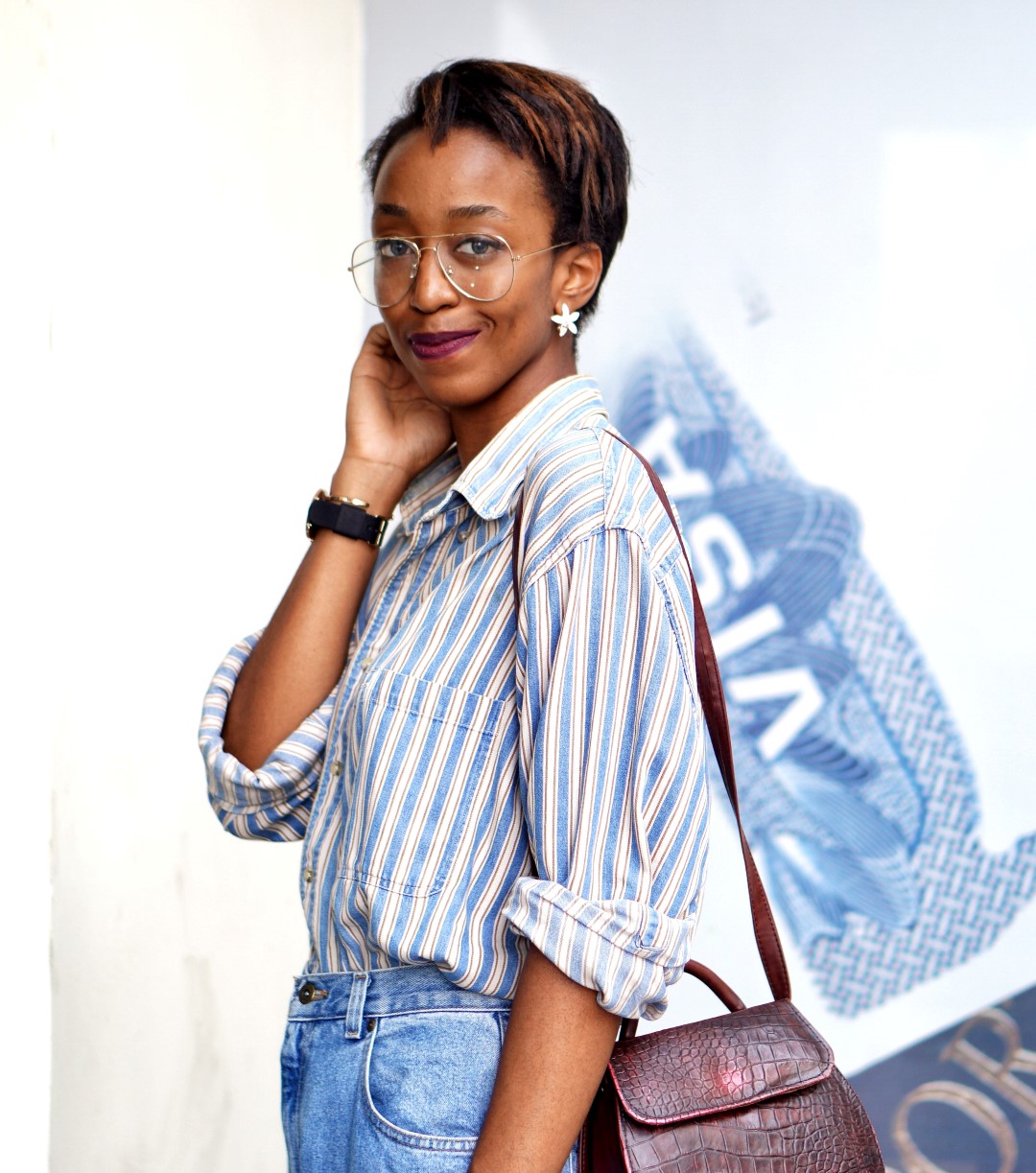 Nigerian fashion blogger cassie daves wearing oversized denim shirt 