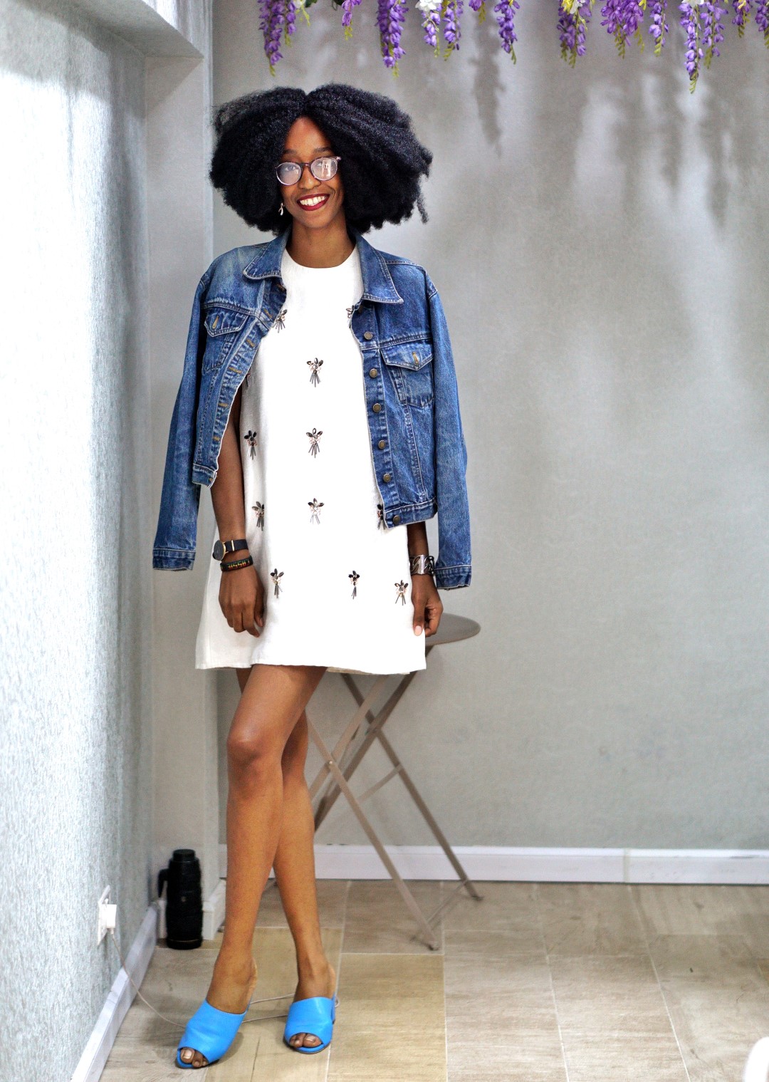 Nigerian Blogger Cassie Daves in topshop shift dress, denim jacketand blue mules