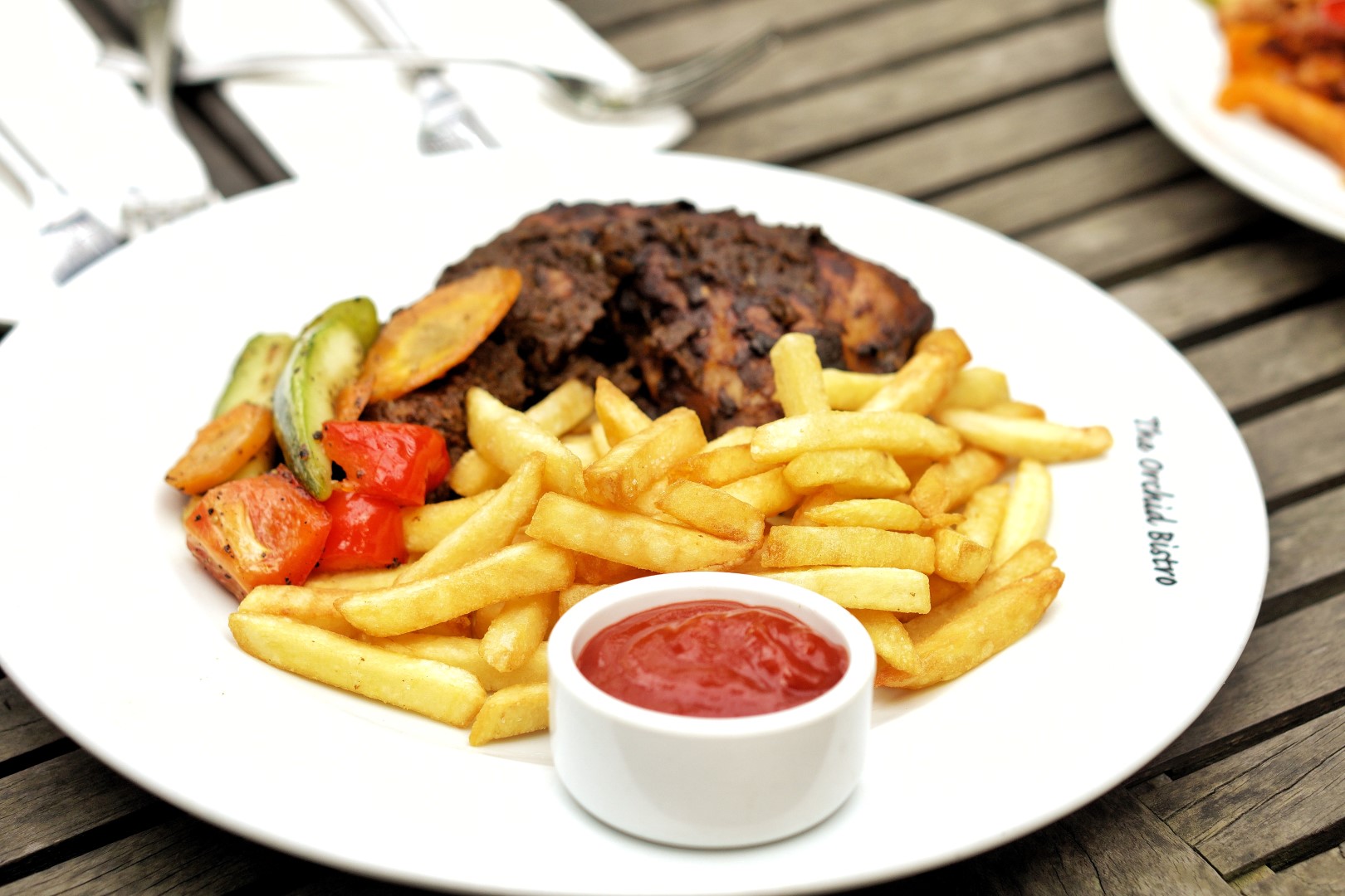 Fries and chicken at the orchid bistro restaurant
