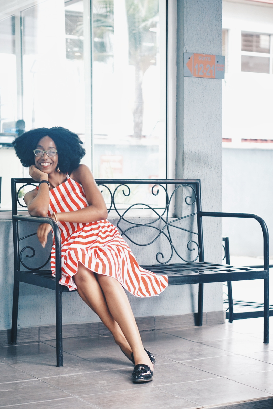 taking stock Nigerian blogger cassie daves in a striped red dress