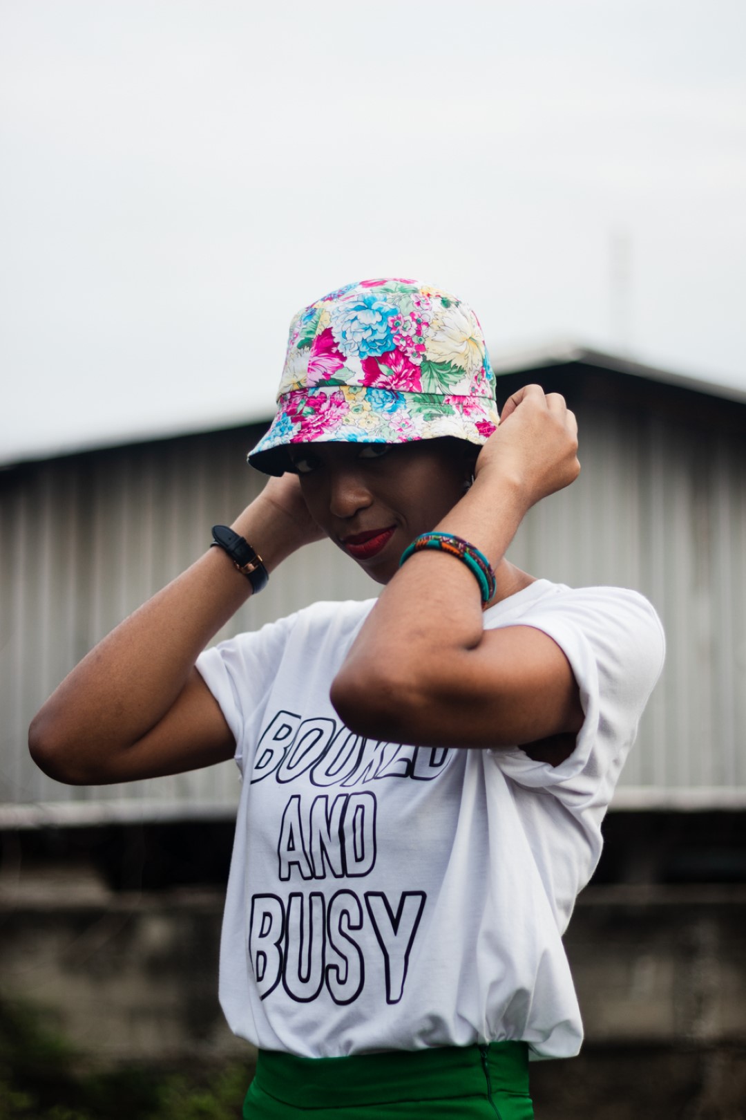 Cassie daves in a bucket hat and Fola Francis tee 