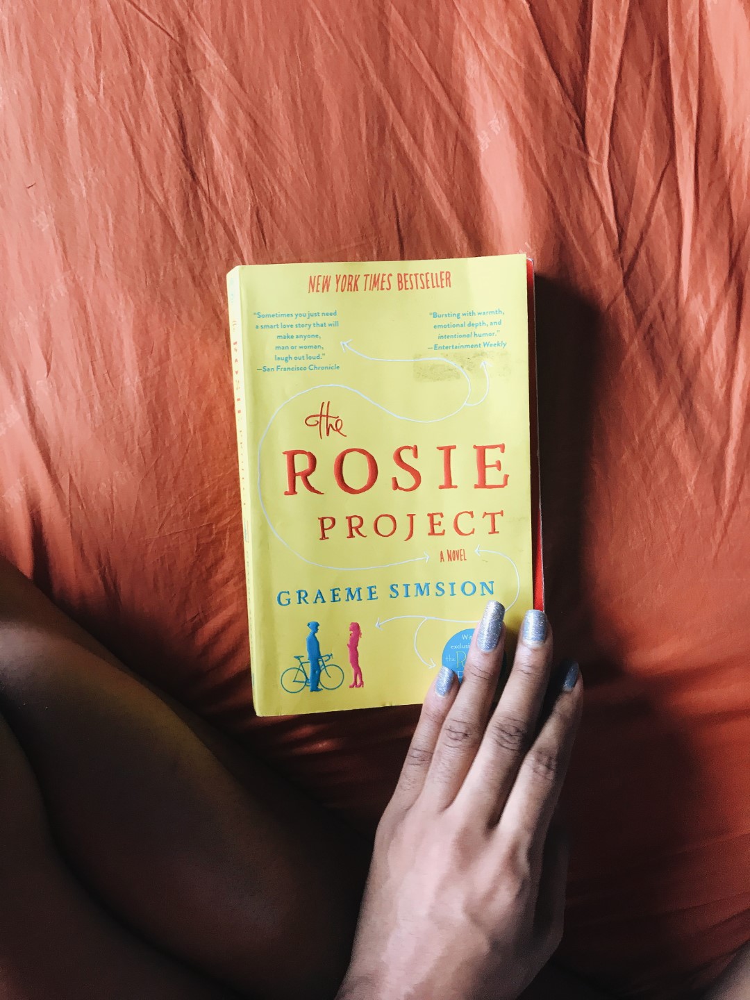 Cassie Daves Nigerian blogger holding the book the rosie project