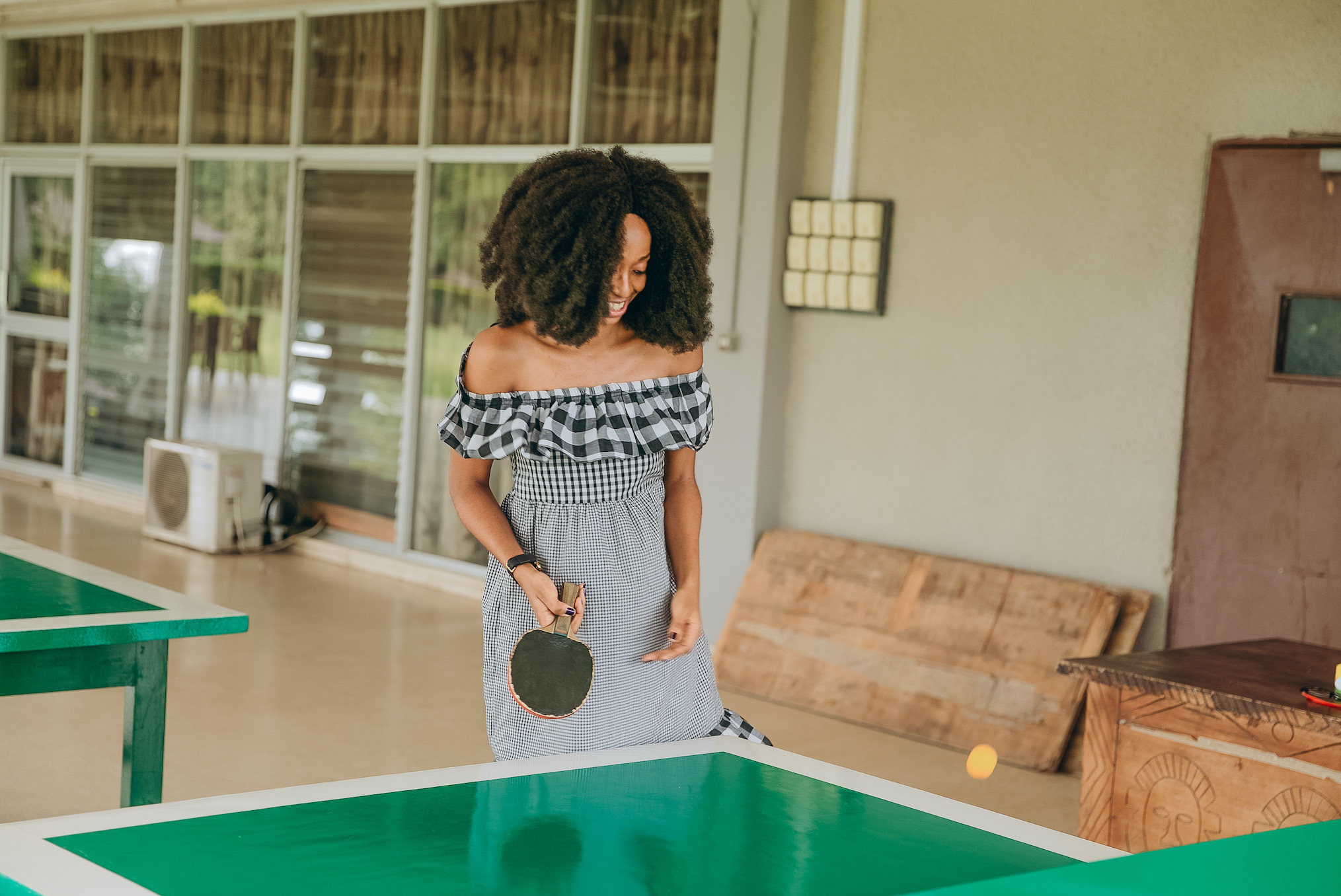 Cassie Daves playing table tennis at IITA hotel ibadan