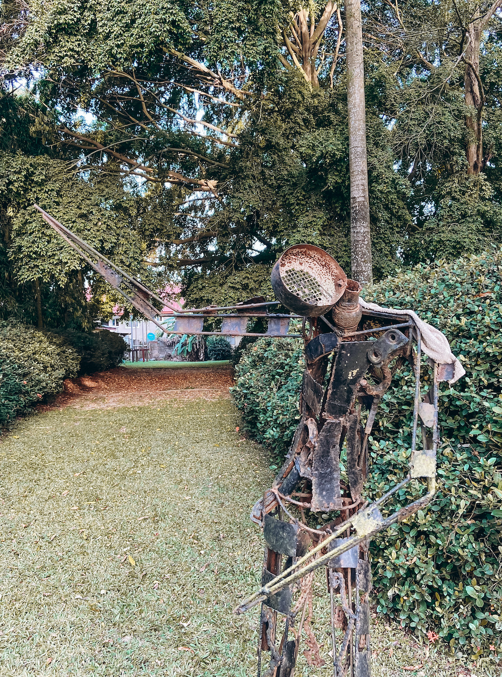  a bronze figure at the Garden at nike guesthouse osogbo