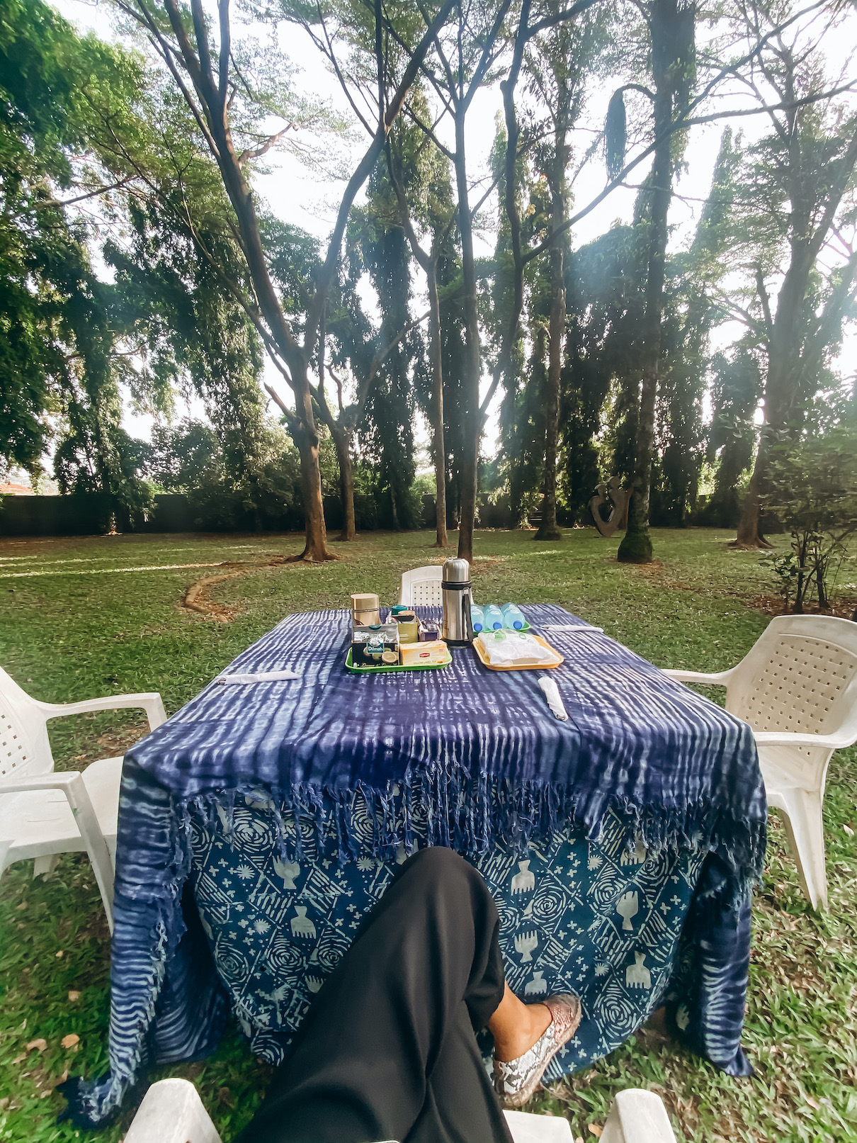 A breakfast table in the Garden at nike guesthouse osogbo